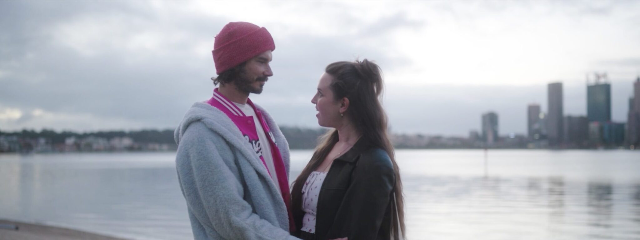 Layover - couple with city background day