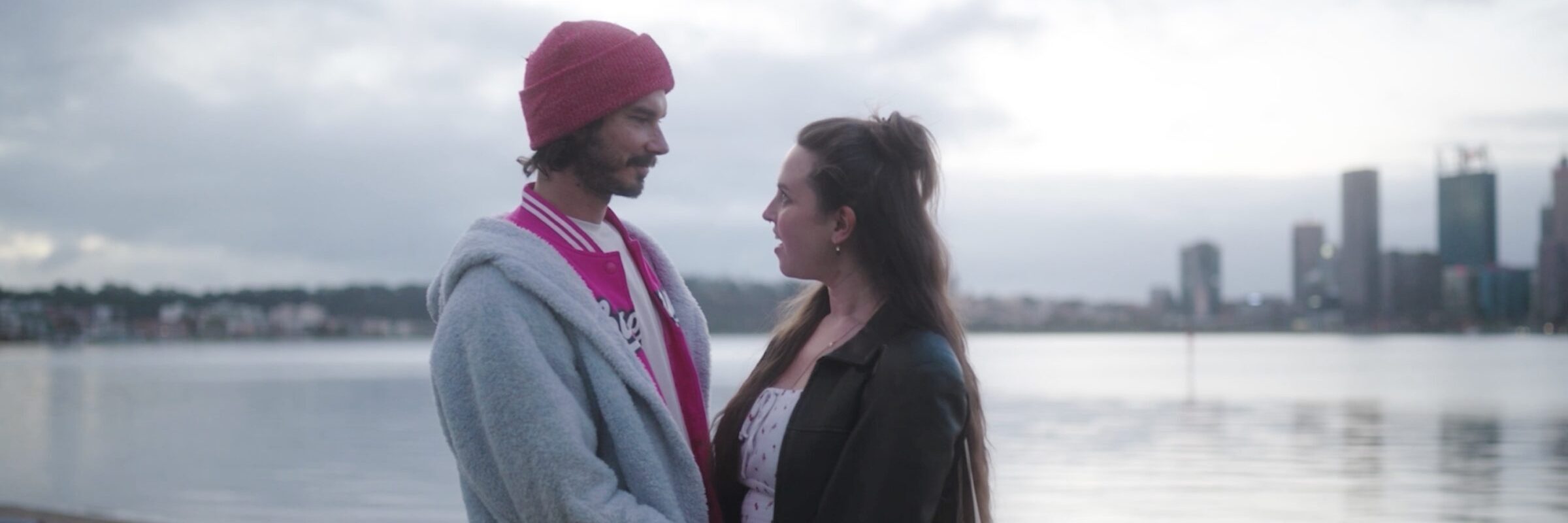 Layover - couple with city background day